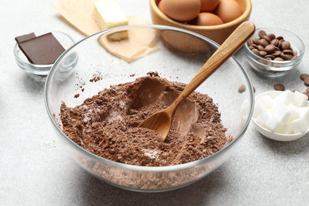 Ingredients for chocolate dough on light table