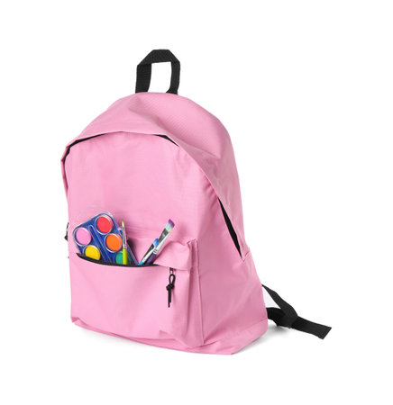 Backpack with watercolor palette and brushes isolated on whiteの写真素材