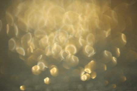 Beautiful shiny glitter on grey background, closeupの写真素材