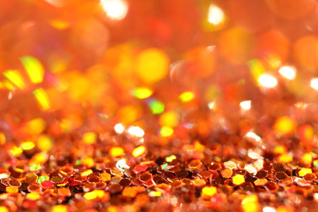Beautiful shiny golden glitter as background, closeupの写真素材