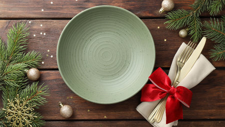 Christmas setting and festive decor on wooden table, flat lay