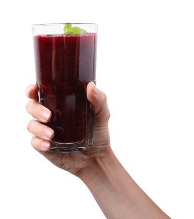Woman holding glass of fresh beetroot smoothie isolated on white, closeupの写真素材