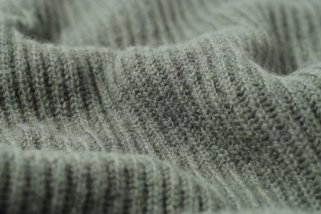 Texture of grey knitted fabric as background, closeupの写真素材