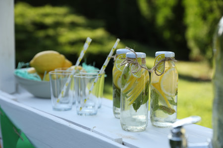 Lemonade stand with refreshing drink in parkの写真素材