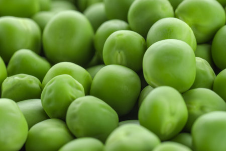 Fresh raw green peas as background, closeupの写真素材
