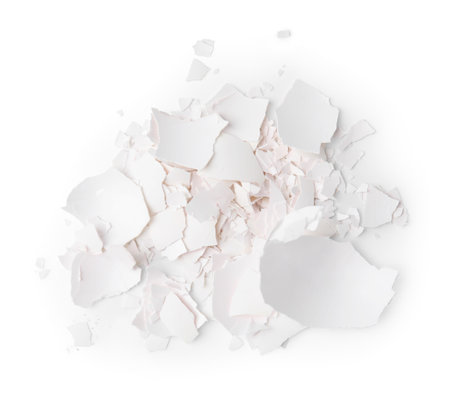 Pile of broken eggshells isolated on white, top viewの写真素材