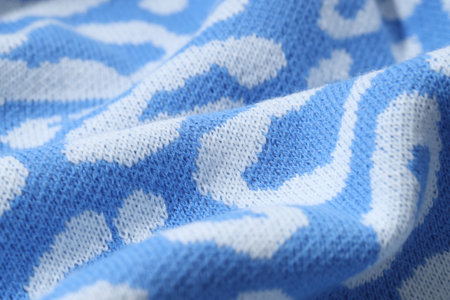 Texture of bright knitted fabric with pattern as background, closeupの写真素材