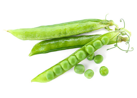 Green fresh peas and pods isolated on white, top viewの写真素材