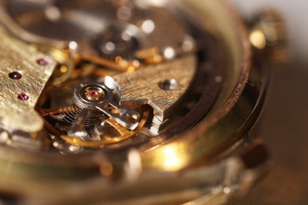 Mechanism of vintage wrist watch on light background, closeupの写真素材