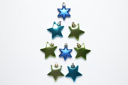 Christmas decor. Different shiny baubles on white background, flat lay