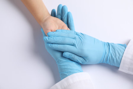 Doctor and child on white background, closeupの写真素材