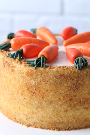 Delicious carrot cake on white table, closeupの写真素材