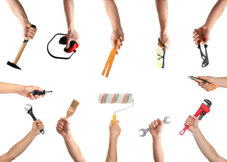 Hands of people with different tools isolated on whiteの写真素材