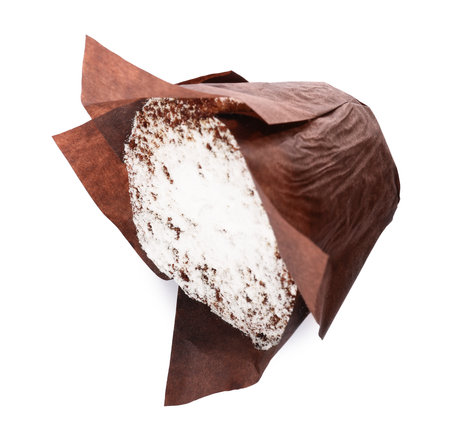 Delicious sweet muffin with powdered sugar isolated on whiteの写真素材