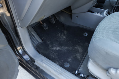 Black soft car floor mat in autoの写真素材