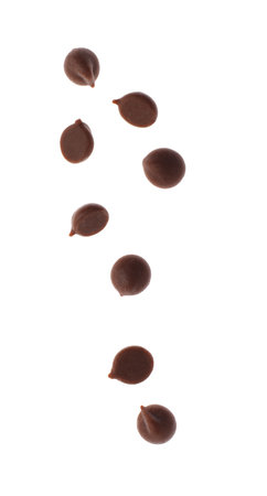 Many sweet chocolate chips isolated on whiteの写真素材