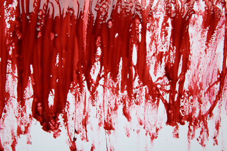 Red blood on white background, top viewの写真素材