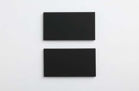 Blank business cards on light gray background, top view. Mockup for designの写真素材