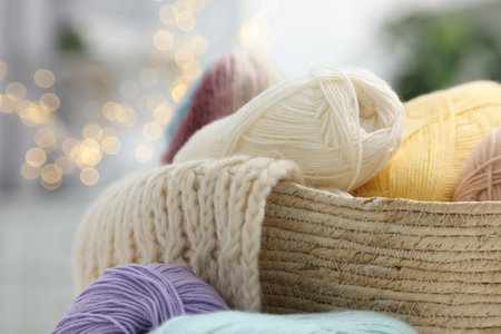Skeins of yarn and knitting sample indoors, closeupの写真素材