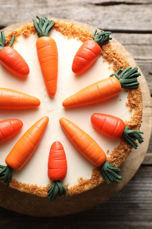 Delicious carrot cake on wooden table, top viewの写真素材