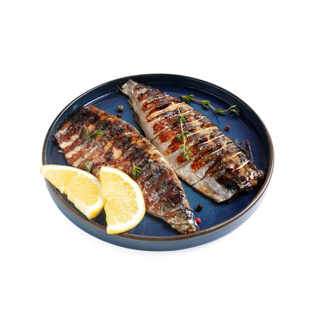 Plate with delicious grilled mackerel, thyme, peppercorns and lemon isolated on whiteの写真素材