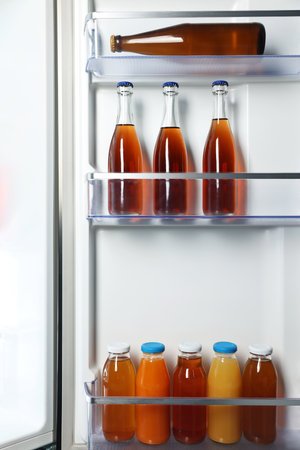 Many different cold drinks in the refrigerator, closeupの写真素材