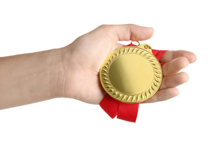 Woman with golden medal on white background, closeupの写真素材