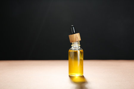 Natural tincture in bottle on color backgroundの写真素材