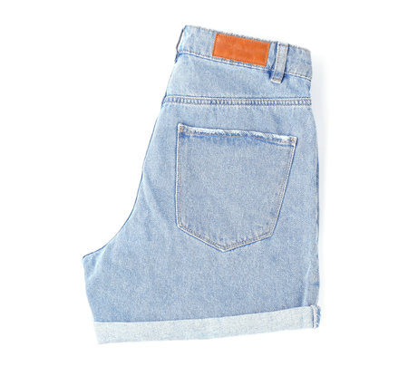 Stylish light blue denim shorts isolated on white, top viewの写真素材