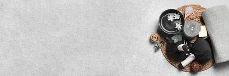 Flat lay composition with cosmetic products for spa treatment on white background, banner design. Space for textの写真素材