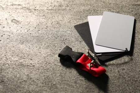 White balance calibration cards on gray background, closeup. Space for textの写真素材