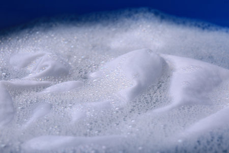 White garment in suits, closeup. Hand washing laundryの写真素材