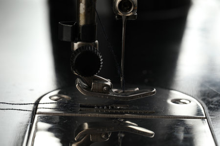 Professional sewing machine on blurred background, macro viewの写真素材