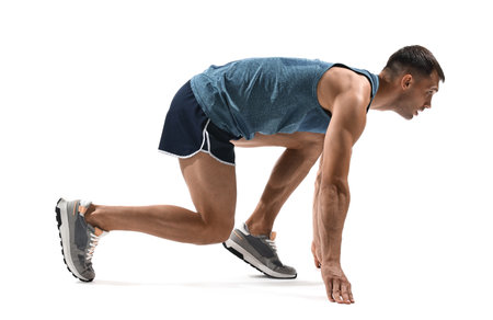 Person in starting position for run on white background