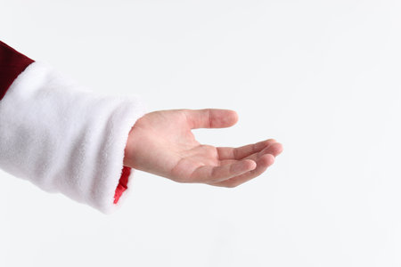 Santa Claus holding something on white background, closeupの写真素材