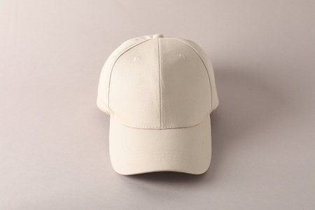 Stylish baseball cap on light gray background. Mockup for design