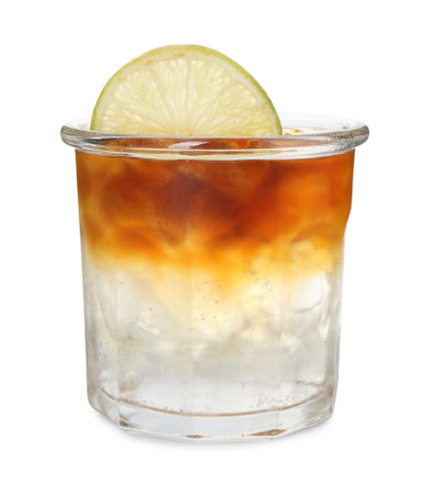 Refreshing espresso tonic drink with slice of lime isolated on white