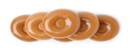 Tasty hard toffee candies isolated on white, top viewの写真素材