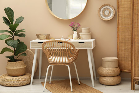 Stylish dressing table with mirror in roomの写真素材