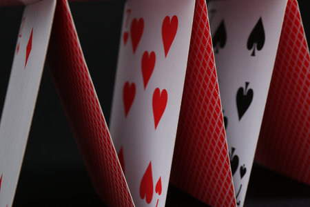 House of playing cards on black background, closeupの写真素材