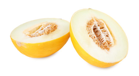 Halves of ripe melon isolated on whiteの写真素材