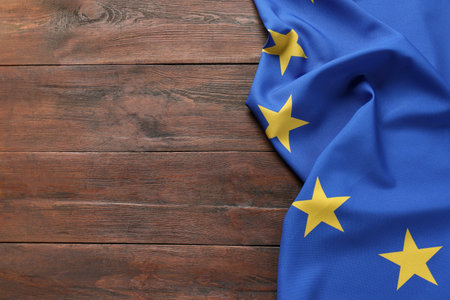 Flag of European Union on wooden background, top view. Space for textの写真素材