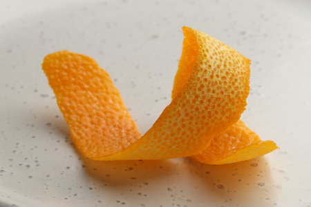 Fresh orange peel on light table, closeupの写真素材