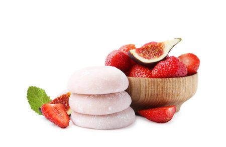 Delicious mochi, strawberries and figs isolated on whiteの写真素材