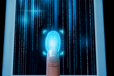 Man using fingerprint scanner in tablet by touching it, closeupの写真素材