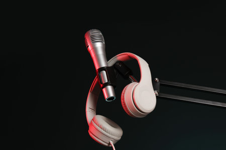 Stand with microphone and headphones indoors, low angle view. Sound recording and reinforcementの写真素材