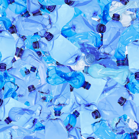 Many used crumpled plastic bottles as backgroundの写真素材