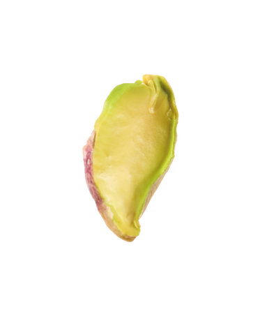 Half of peeled pistachio nut isolated on whiteの写真素材