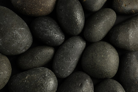 Wet spa stones as background, top viewの写真素材