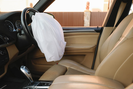 Opened airbag in automobile. Car safety equipmentの写真素材